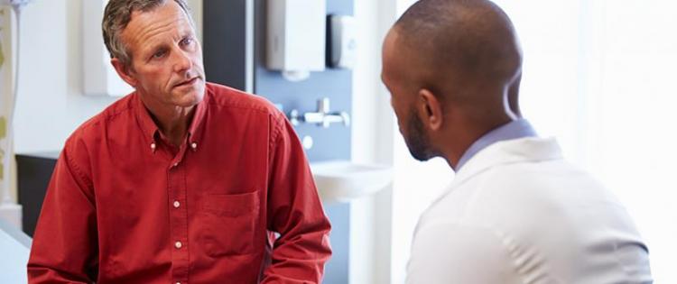 Doctor talking to patient