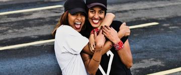 Two women embracing. 