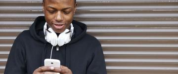 Teen looking at phone