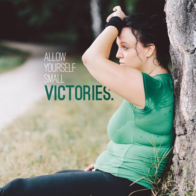 Photo of a sweating woman resting by a tree with text saying "Allow yourself small victories."
